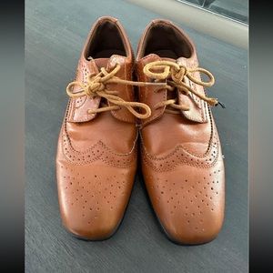 Boys like new dress shoes